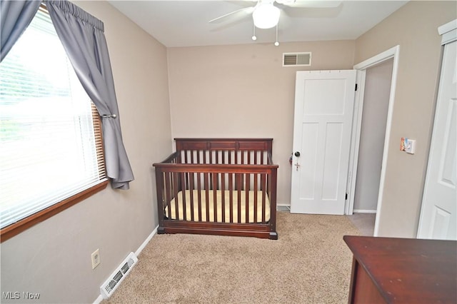 48 Mary Ann Ln, Youngstown, OH 44511 - bedroom featuring carpet flooring, a crib, and a ceiling fan