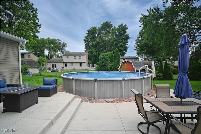 48 Mary Ann Ln, Youngstown, OH 44511 - view of patio / terrace with an outdoor pool and outdoor lounge area