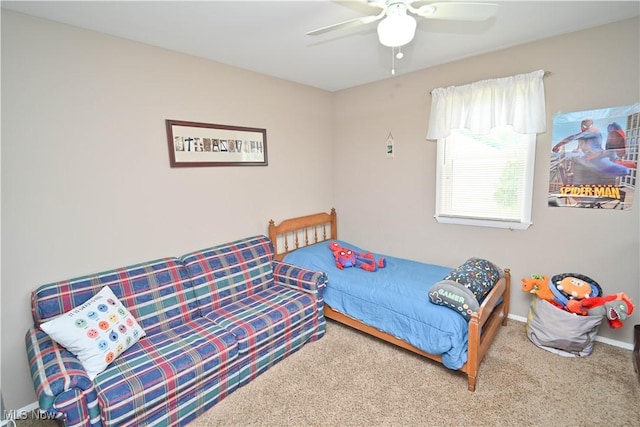 48 Mary Ann Ln, Youngstown, OH 44511 - carpeted bedroom with a ceiling fan and baseboards