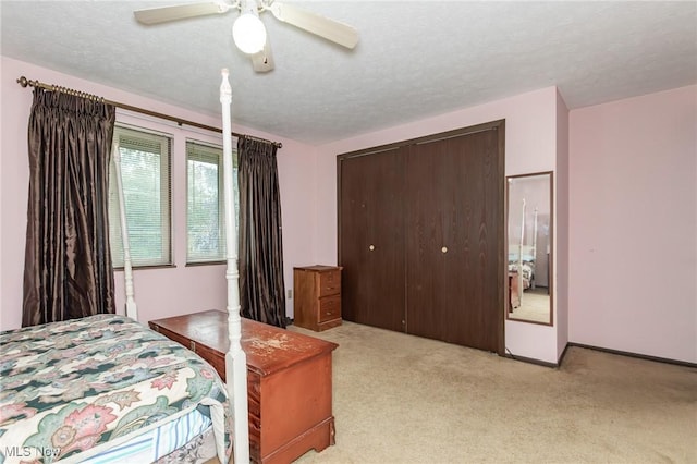 751 Bacon Rd, Oh, OH 44077 - bedroom featuring light colored carpet, a closet, ceiling fan, and a textured ceiling
