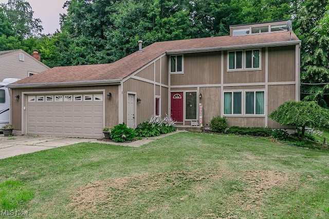 751 Bacon Rd, Oh, OH 44077 - view of front of property with a garage, a front lawn, concrete driveway, and roof with shingles