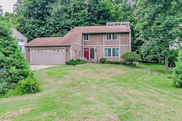 751 Bacon Rd, Oh, OH 44077 - view of front of house with an attached garage, concrete driveway, a front lawn, and roof with shingles