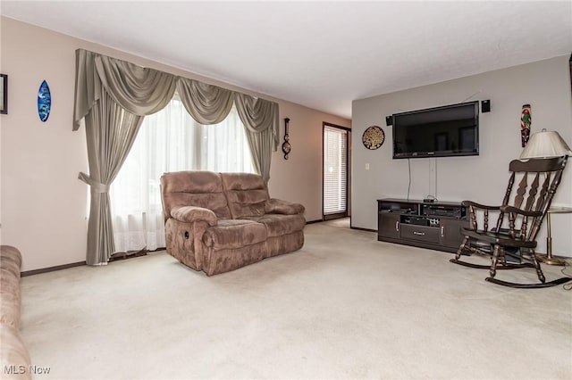 751 Bacon Rd, Oh, OH 44077 - living area with carpet floors and baseboards