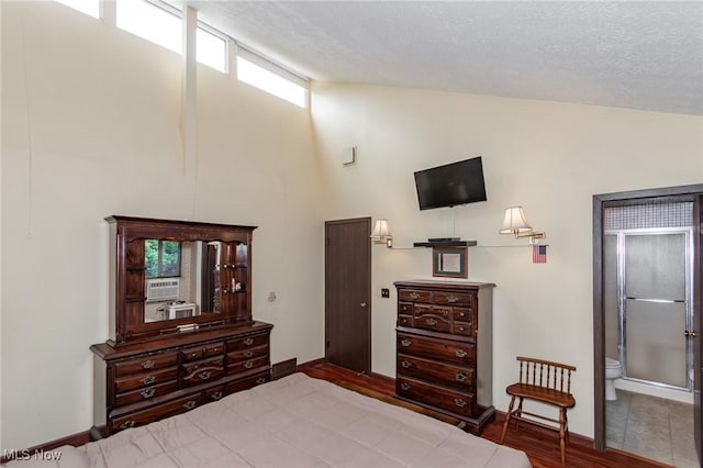 751 Bacon Rd, Oh, OH 44077 - bedroom featuring high vaulted ceiling, wood finished floors, cooling unit, and connected bathroom