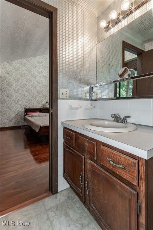 751 Bacon Rd, Oh, OH 44077 - bathroom featuring vanity and wood finished floors