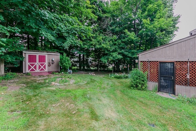 751 Bacon Rd, Oh, OH 44077 - view of grassy yard with a storage unit