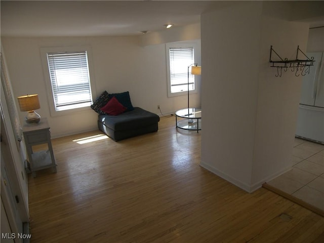 24 E 220th St E, Euclid, OH 44123 - living area with wood finished floors and healthy amount of natural light