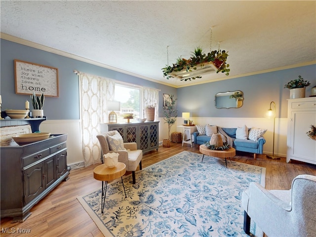 14003 Highview Dr, Dalton, OH 44618 - living area featuring ornamental molding, a textured ceiling, and light wood-type flooring