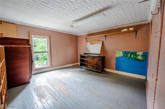 55225 Township Road 224, Fresno, OH 43824 - unfurnished bedroom featuring baseboards and hardwood / wood-style flooring