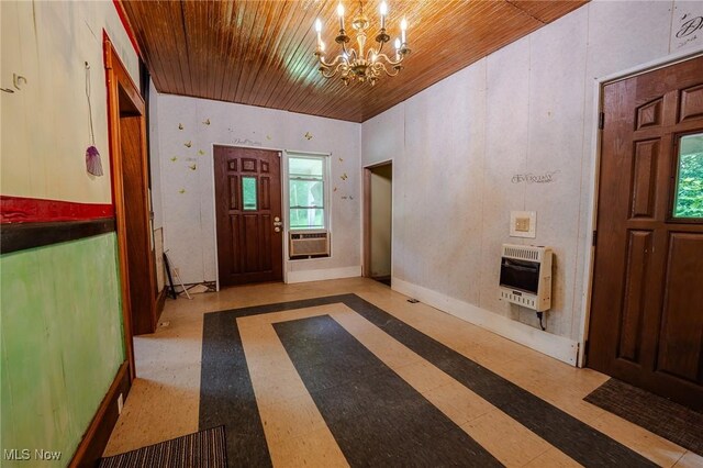 55225 Township Road 224, Fresno, OH 43824 - foyer featuring heating unit, a chandelier, inlaid floor details, wooden ceiling, and cooling unit