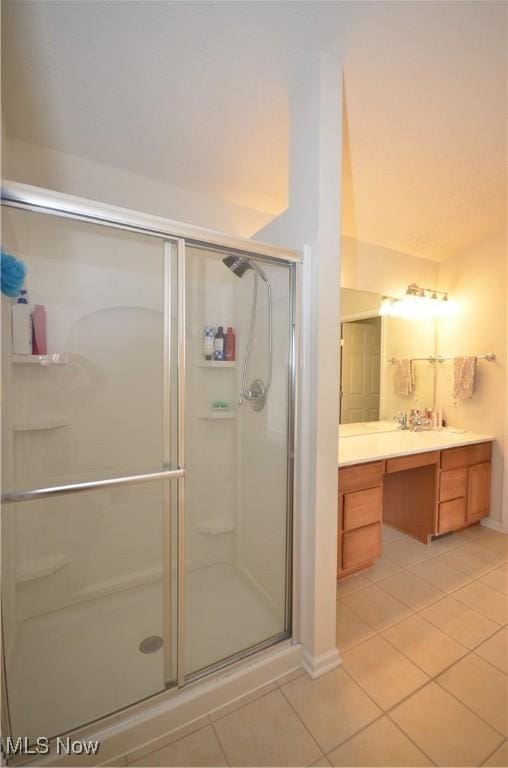 4909 Garnet Cir, Stow, OH 44224 - full bath with tile patterned flooring, vanity, and a shower stall