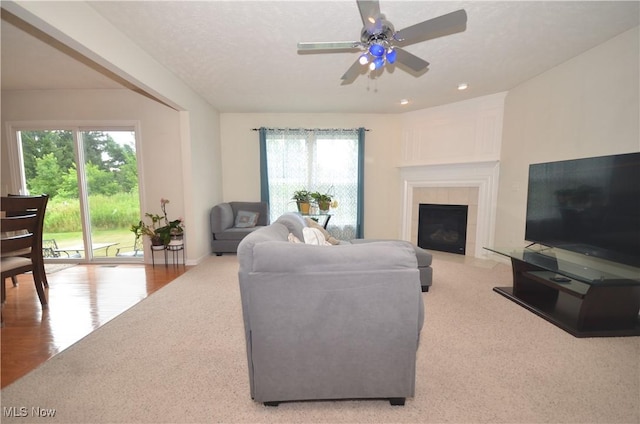 4909 Garnet Cir, Stow, OH 44224 - living room featuring a ceiling fan, a fireplace, and recessed lighting