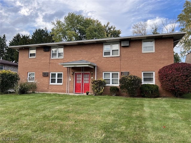 862 Cook Ave, Youngstown, OH 44512 - view of front of house featuring a front yard and brick siding