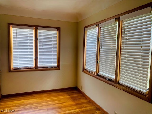 1528 Felton Rd, South Euclid, OH 44121 - unfurnished room with light wood-style flooring and baseboards