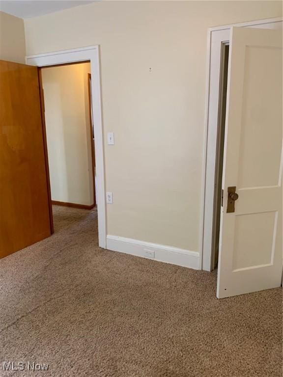 1528 Felton Rd, South Euclid, OH 44121 - empty room featuring carpet floors and baseboards