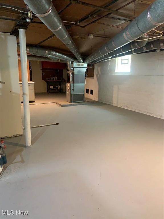 1528 Felton Rd, South Euclid, OH 44121 - below grade area featuring heating unit