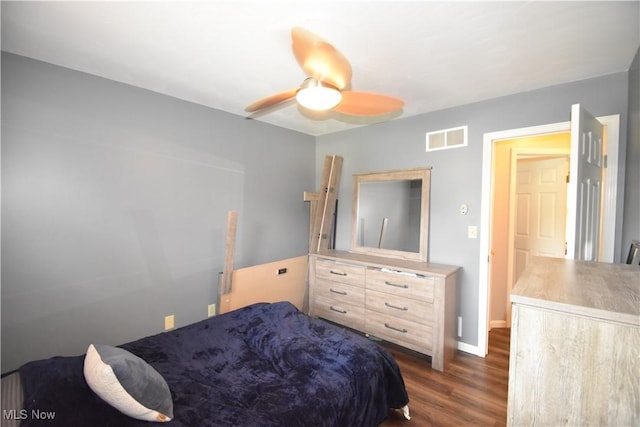 307 Crimson Cir, Campbell, OH 44405 - bedroom featuring dark wood-type flooring and a ceiling fan