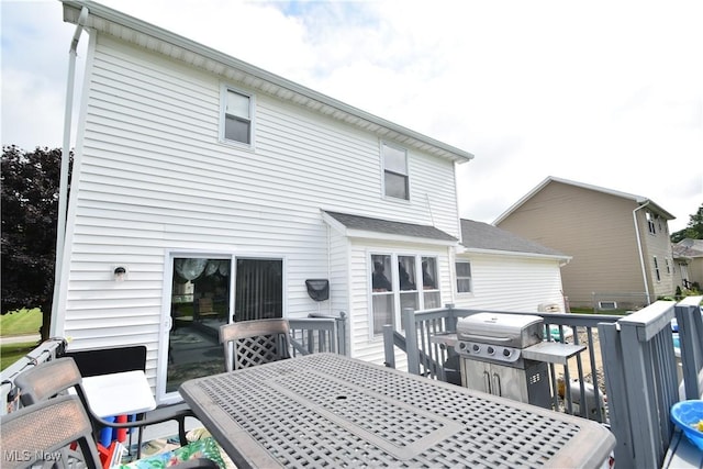 307 Crimson Cir, Campbell, OH 44405 - deck with outdoor dining space and a grill