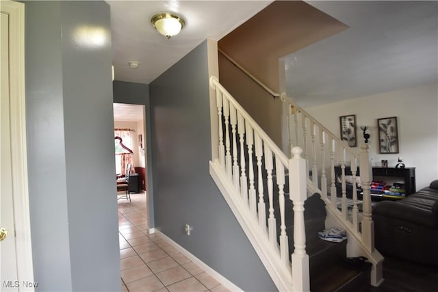 307 Crimson Cir, Campbell, OH 44405 - stairs with tile patterned floors and baseboards