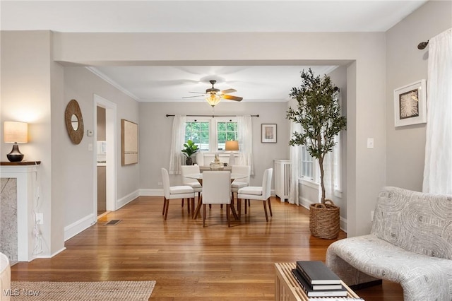 16205 Fernway Rd, Shaker Heights, OH 44120 - dining space with ceiling fan, light wood-style floors, and ornamental molding