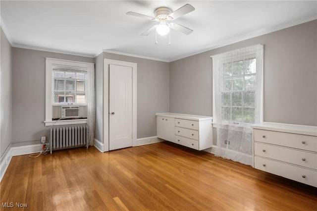16205 Fernway Rd, Shaker Heights, OH 44120 - unfurnished bedroom featuring radiator, light wood-style flooring, ornamental molding, cooling unit, and ceiling fan
