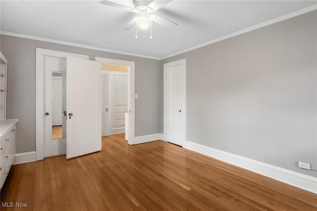 16205 Fernway Rd, Shaker Heights, OH 44120 - unfurnished bedroom with light wood finished floors, crown molding, and a ceiling fan