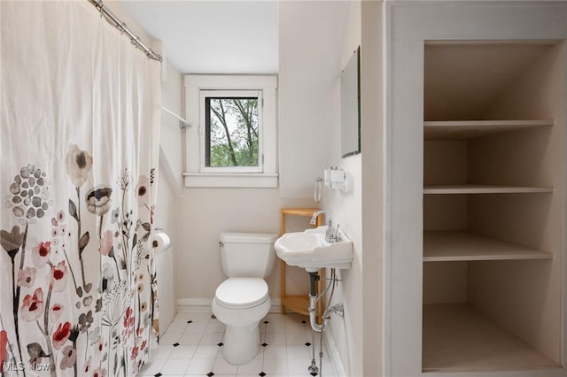 16205 Fernway Rd, Shaker Heights, OH 44120 - bathroom with tile patterned floors and a shower with shower curtain