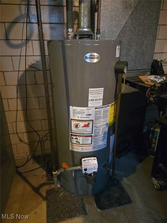 4544 Springvale Ave SW, Canton, OH 44706 - utility room featuring water heater