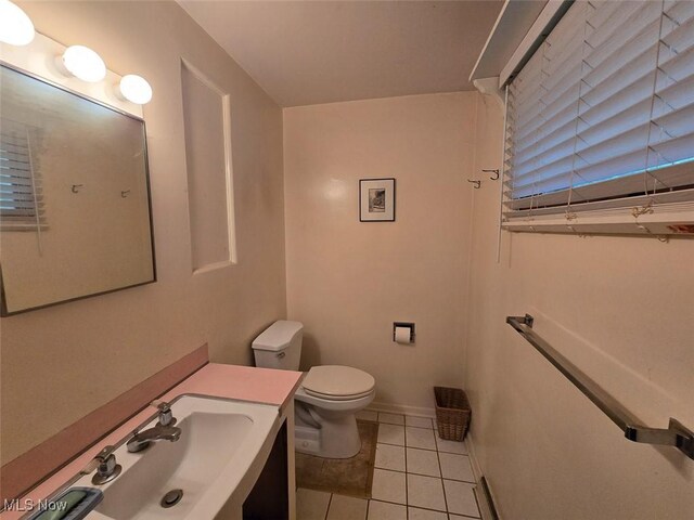 4544 Springvale Ave SW, Canton, OH 44706 - bathroom with tile patterned flooring and vanity