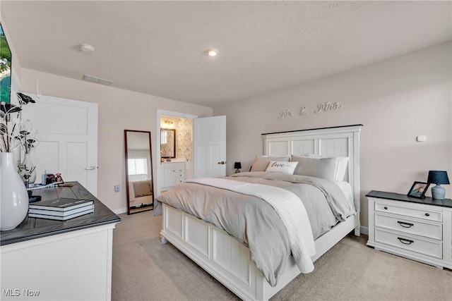 3772 Willow Way, Perry, OH 44081 - bedroom featuring light carpet and ensuite bathroom