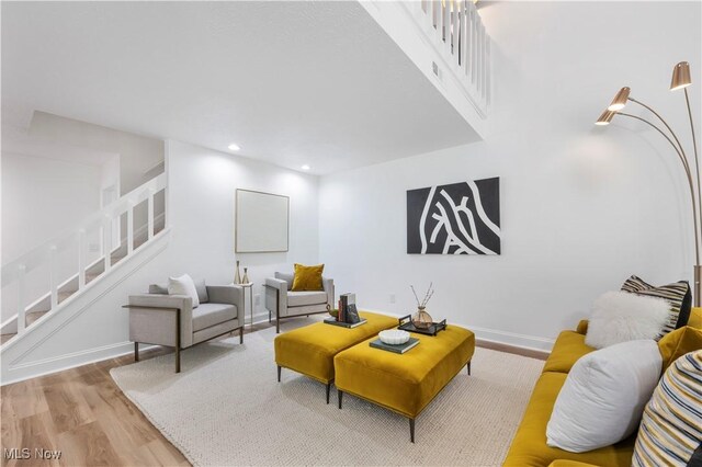 1226 Ramblewood Trl, South Euclid, OH 44121 - living area with stairs, wood finished floors, and recessed lighting