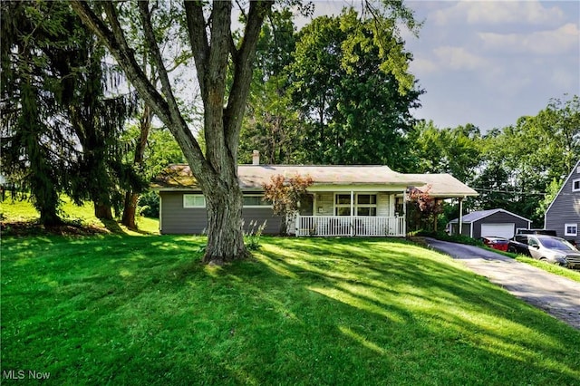 382 Rosemont Ave, Austintown, OH 44515 - ranch-style house with a porch, a front lawn, and asphalt driveway