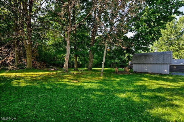 382 Rosemont Ave, Austintown, OH 44515 - view of green lawn featuring an outbuilding