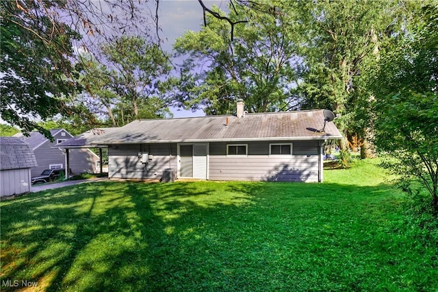 382 Rosemont Ave, Austintown, OH 44515 - rear view of house with a lawn