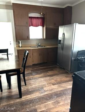 120 Welday Ave, Steubenville, OH 43952 - kitchen with stainless steel fridge with ice dispenser, crown molding, light countertops, and dark wood finished floors
