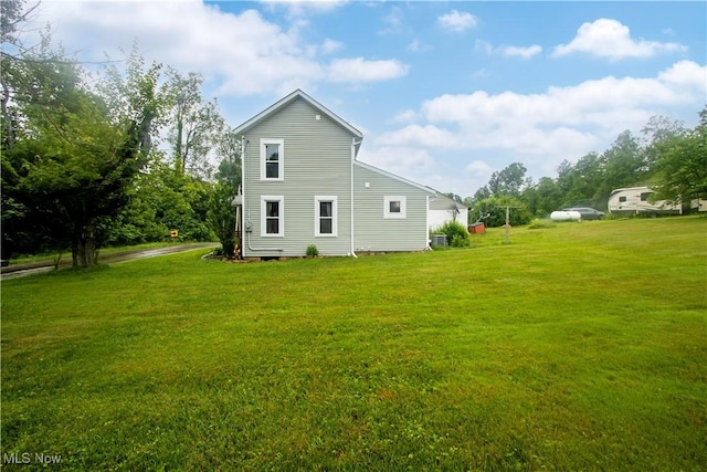 4234 Swigart Rd, Bellville, OH 44813 - rear view of property with a yard