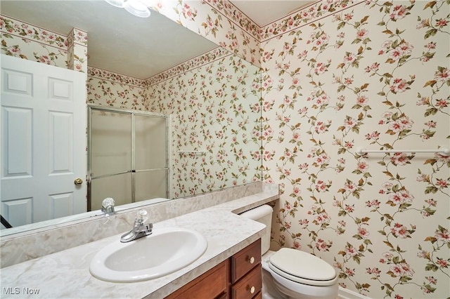 1977 Fox Trace Trl, Cuyahoga Falls, OH 44223 - full bath featuring wallpapered walls, a shower stall, and vanity