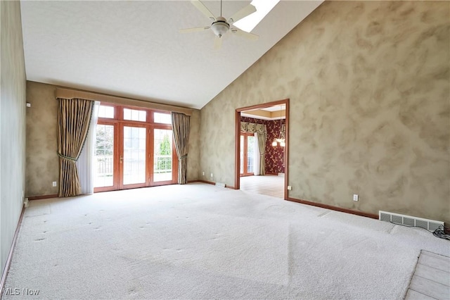 1977 Fox Trace Trl, Cuyahoga Falls, OH 44223 - carpeted empty room with high vaulted ceiling and a ceiling fan