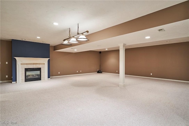 1977 Fox Trace Trl, Cuyahoga Falls, OH 44223 - unfurnished living room featuring carpet flooring, recessed lighting, and a tiled fireplace