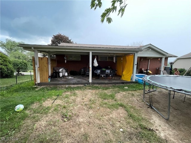 311 Hilda Cir, Bloomingdale, OH 43910 - garage featuring a trampoline