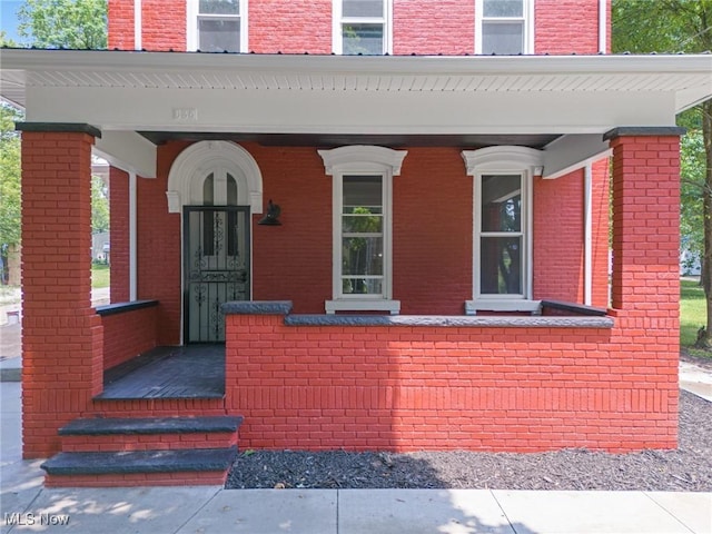 638 High St, Wooster, OH 44691 - property entrance featuring brick siding