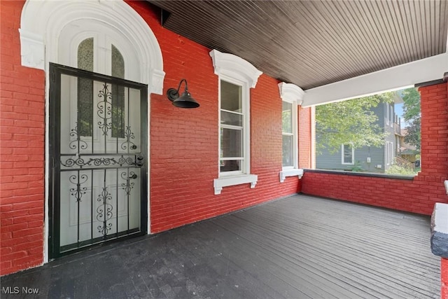 638 High St, Wooster, OH 44691 - entrance to property with covered porch and brick siding