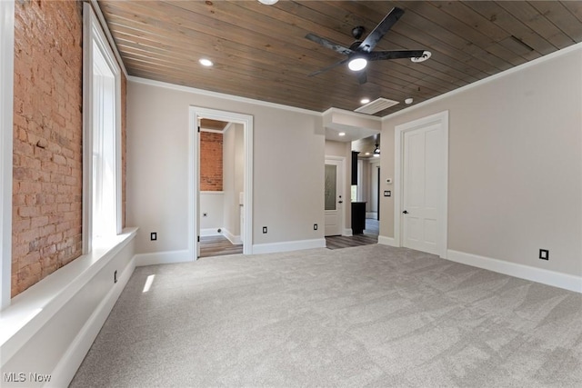 638 High St, Wooster, OH 44691 - unfurnished bedroom featuring wood ceiling, carpet floors, ornamental molding, brick wall, and recessed lighting