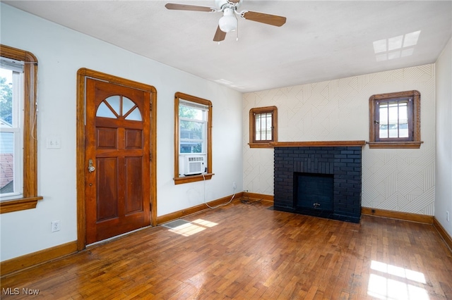 289 E Baird Ave, Barberton, OH 44203 - entrance foyer with hardwood / wood-style floors, healthy amount of natural light, a ceiling fan, and cooling unit