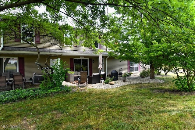4914 Independence Cir Unit D, Stow, OH 44224 - rear view of property featuring an outdoor living space, a yard, and a patio