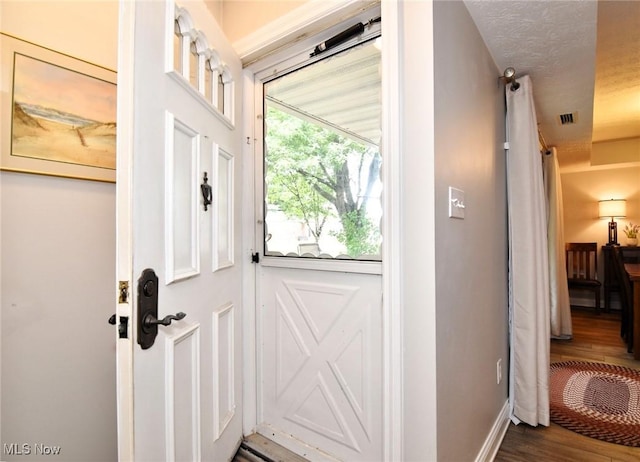 4914 Independence Cir Unit D, Stow, OH 44224 - doorway featuring dark wood-style flooring and baseboards