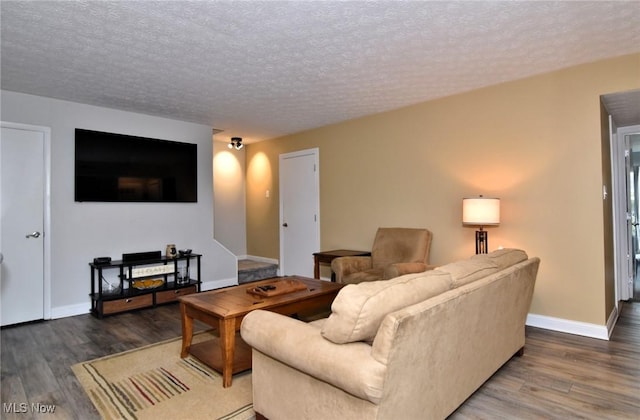 4914 Independence Cir Unit D, Stow, OH 44224 - living area featuring wood finished floors and a textured ceiling
