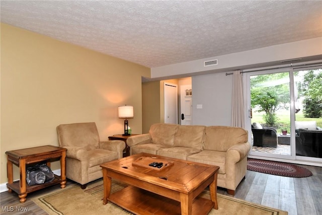 4914 Independence Cir Unit D, Stow, OH 44224 - living area with wood finished floors and a textured ceiling