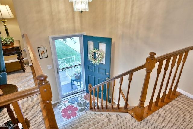 2555 Walnut St, Girard, OH 44420 - entryway with carpet flooring, stairway, and a high ceiling