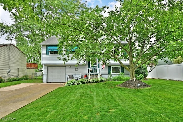 2555 Walnut St, Girard, OH 44420 - view of front of home featuring concrete driveway and an attached garage